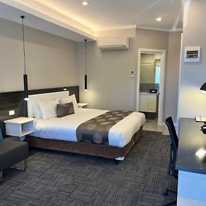 Camera corporativa con letto king size